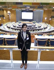 Photo of Khushi in the chamber of the Trusteeship Council.