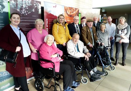 Photo of Cllr Brian Allinson with some of the residents who contributed stories.