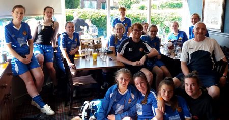 Photo of the Bradley Stoke Ladies FC first team squad, with manager Martin Lee and assistant manager Ross Lee, relaxing after their final match of the 2018/19 season, against league winners Cheltenham Town.