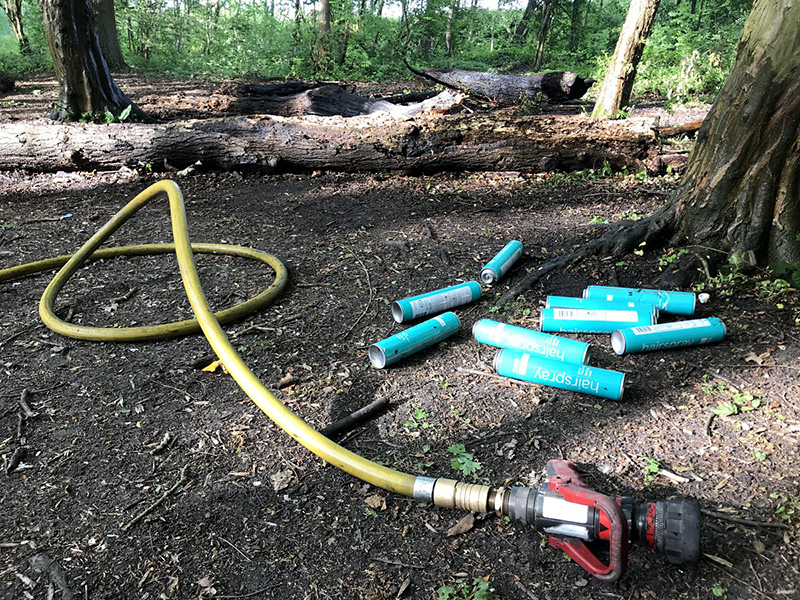 Photo showing the aftermath of a small unauthorised fire in Savages Wood, after it was extinguished by a fire service crew.