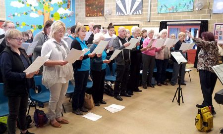 Photo of the singing workshop in progress.