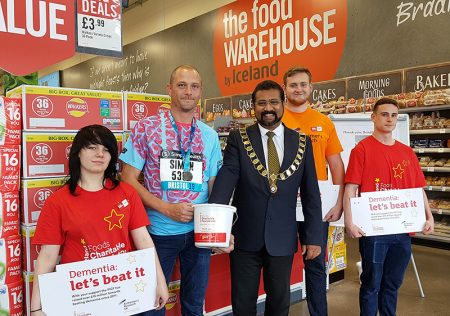 Photo of Bradley Stoke mayor Tom Aditya with Food Warehouse staff.