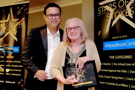 Photo of Dee Crowther with event host Paul Sinha.