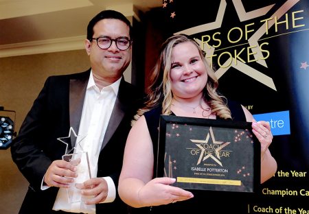 Photo of Isabelle Potterton with event host Paul Sinha.