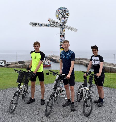 Photo of (l-r) Ryan Edwards, Scott Warburton and Alessandro Bufalino at John O'Groats.