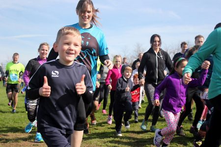 Photo of runners taking part in a previous Mojo Muddy Madness event.