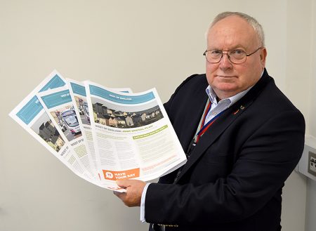 Photo of Cllr Brian Allinson holding JSP consultation documents.