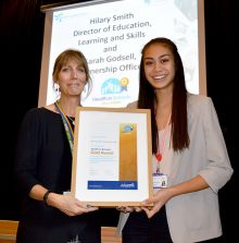 Photo of Jemina Paramore accepting the 'Health in Schools' Gold Award from Sarah Godsell.