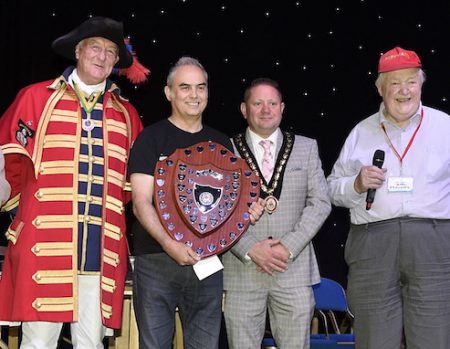 Photo of the Issigonis Shield being presented to Steve Briancourt.