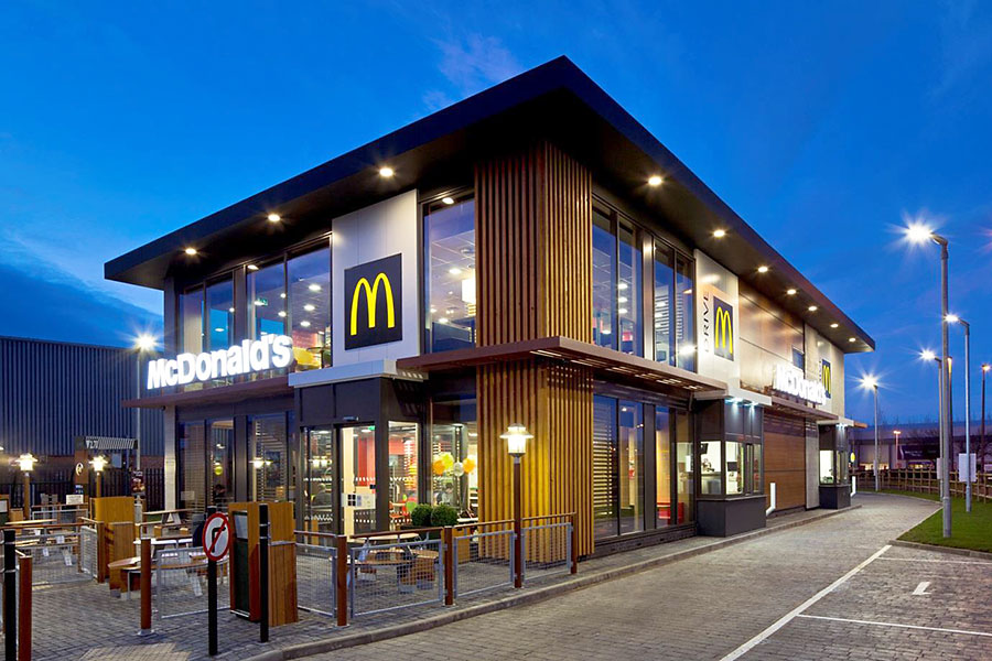 Photo of a typical McDonald's restaurant with drive-through.