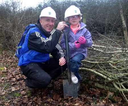 Photo of a young volunteer on the hedgelaying weekend.