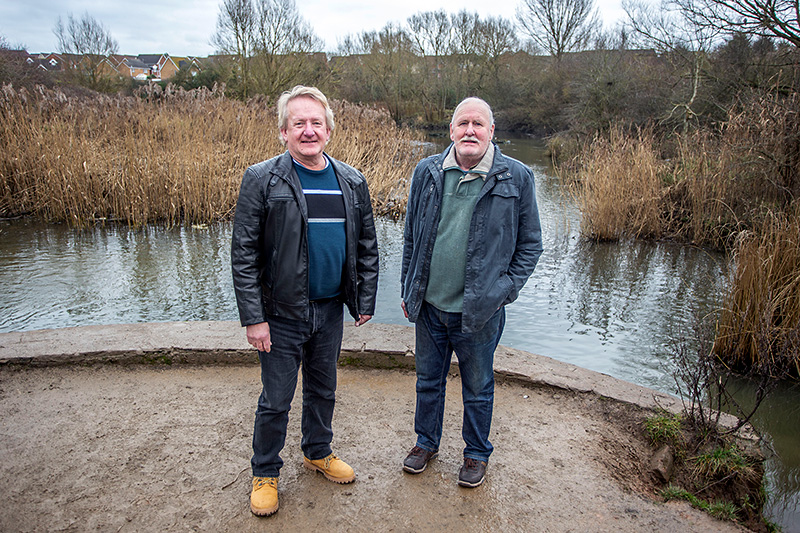 Photo of Cllrs John Ashe (left) and Roger Avenin at the lake.
