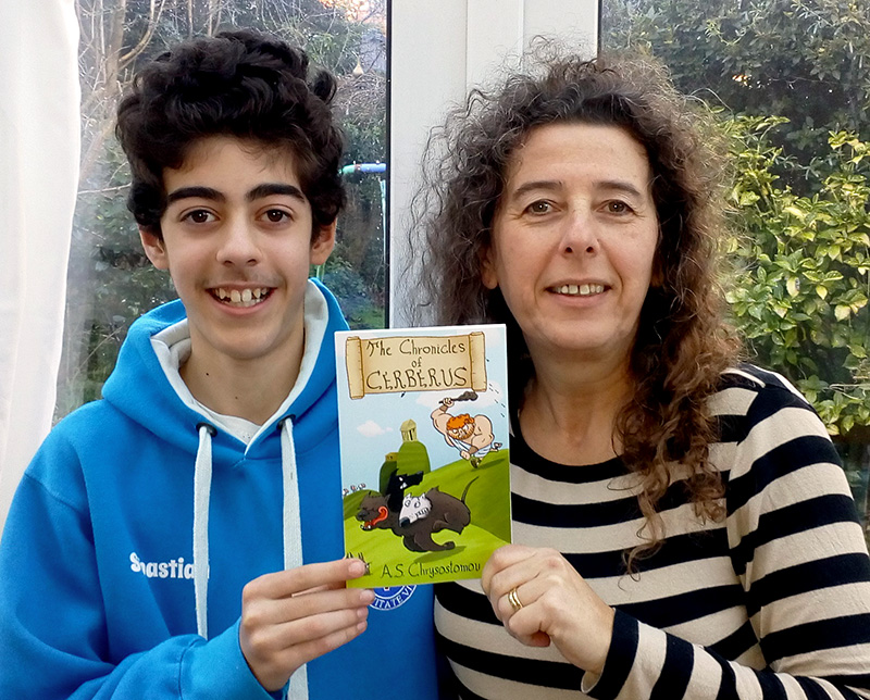 Alicia and Sebastian holding a copy of their book .