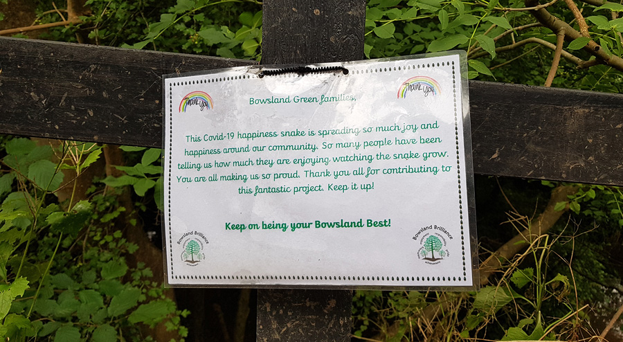 Photo of a notice posted near the 'happiness snake'.
