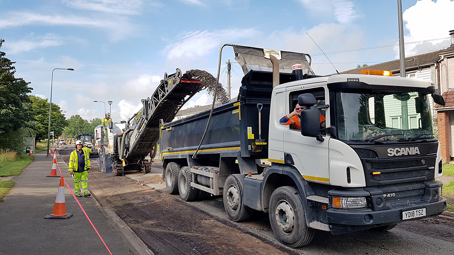 Photo of asphalt milling in progress on Orpheus Avenue.