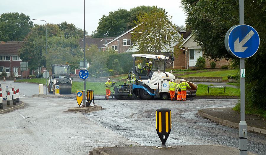 Photo of road resurfacing in progress.