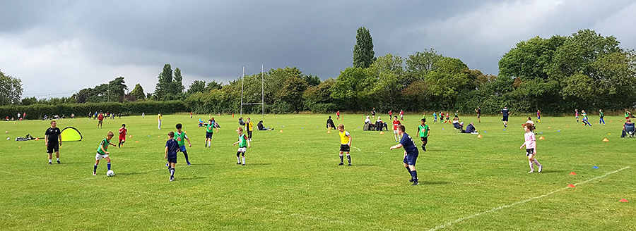 Photo of Bradley Stoke Youth FC teams training at St Mary's RFC ground.