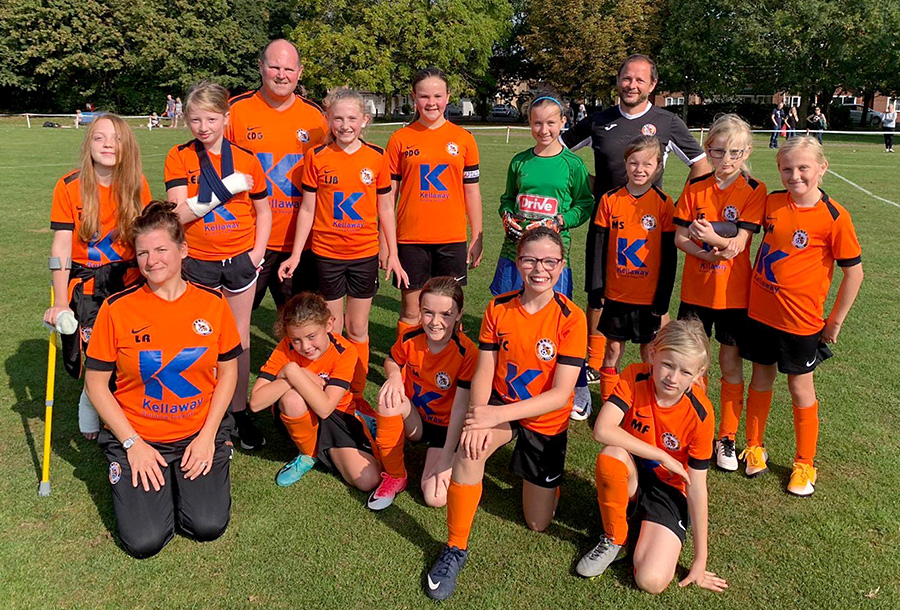 Photo of Bradley Stoke Youth FC Girls players and coaches.