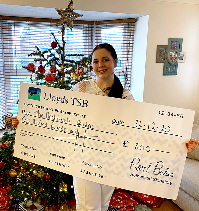 Pearl Bruford with a presentation cheque. Photo of Pearl Bruford with a presentation cheque.