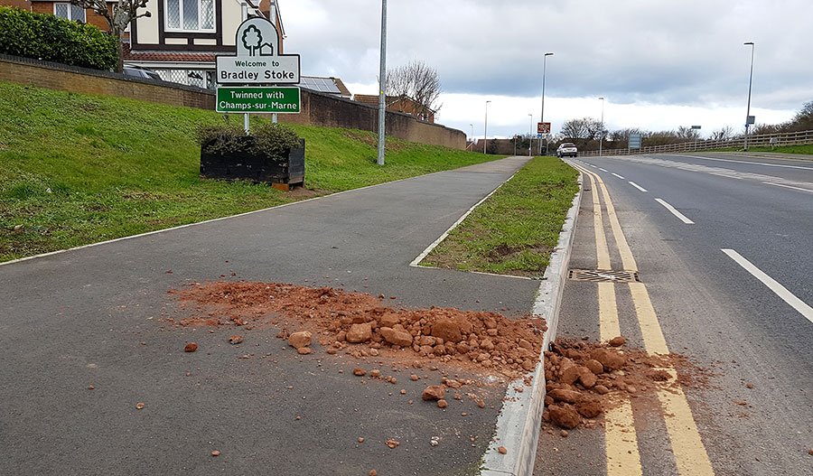 Photo of a pile of earth and rocks on the side of Bradley Stoke Way.