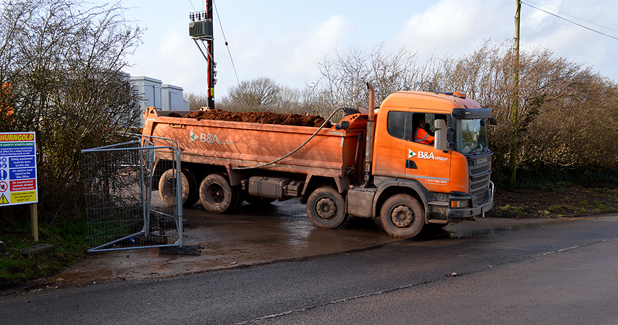 Photo of a tipper truck emerges onto Old Gloucester Road.