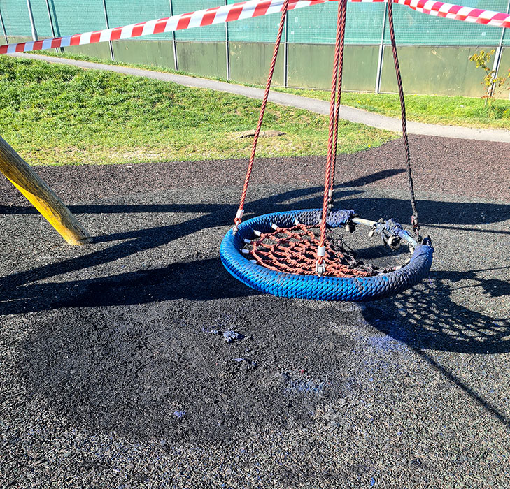 Photo of fire damage to the cradle swing.