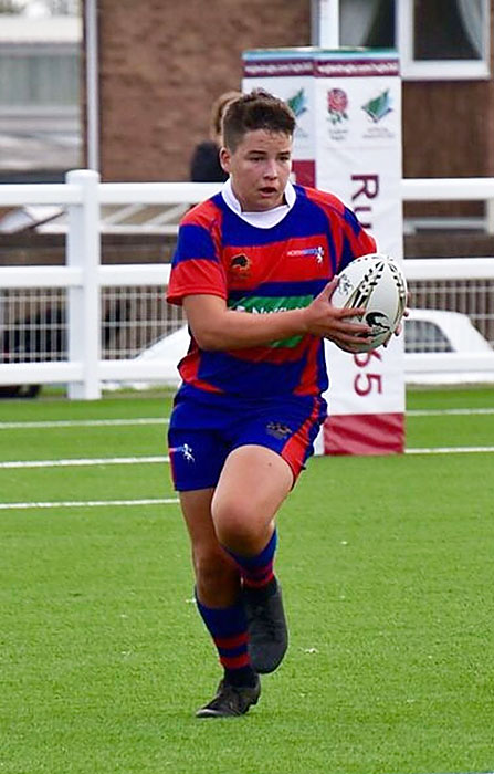 Photo of a rugby player in action.