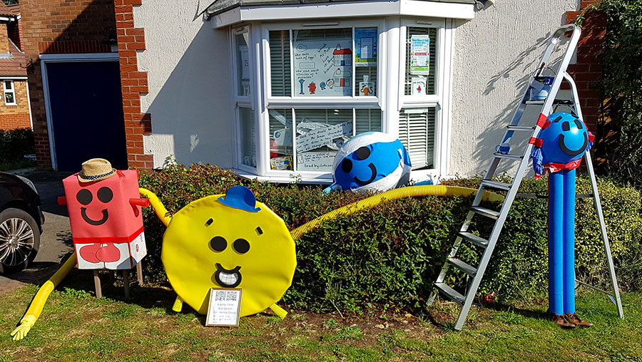 Photo of four scarecrows in the form of Mr Men characters.