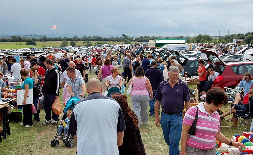 Photo of crowds at an open-air market.