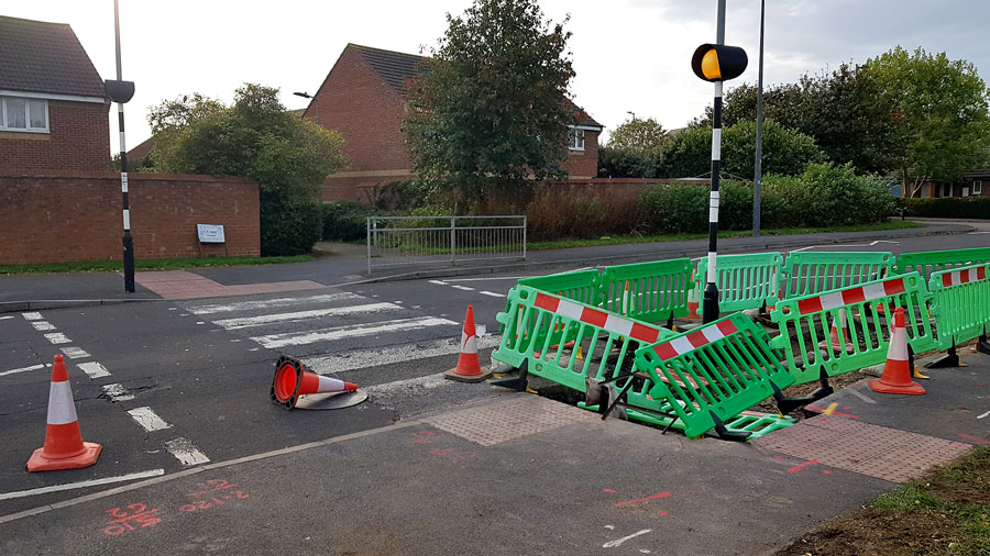 Roadworks at a Zebra crossing on Brook Way, Bradley Stoke, in October 2022. Photo of roadworks at a zebra crossing.